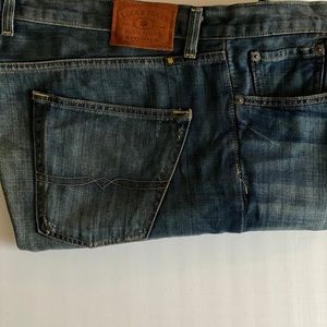 Two pairs of slight worn Lucky Brand jeans.